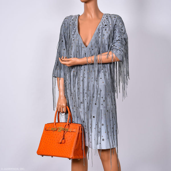 Side profile of Tangerine Ostrich leather Birkin 30 bag