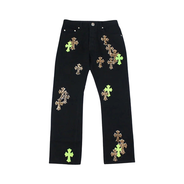 Front view of Chrome Hearts jeans with green and leopard cross patches