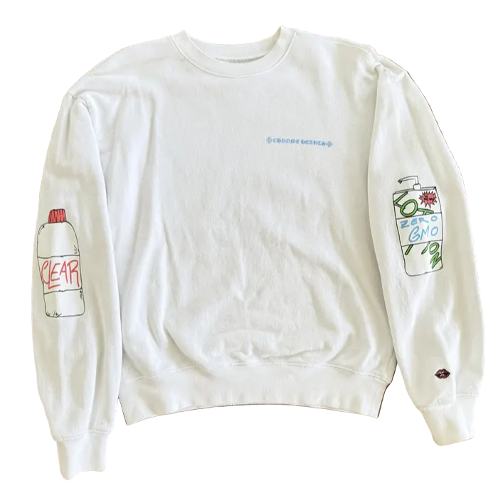 White sweatshirt with graphic designs on a wooden floor