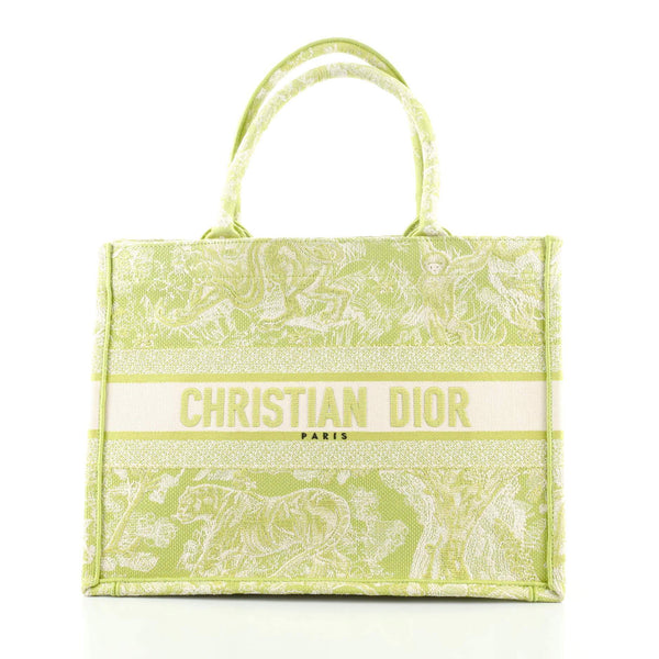 Front view of the Christian Dior Book Tote in green canvas
