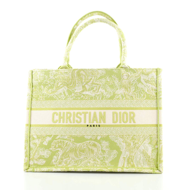 Front view of the Christian Dior Book Tote in green canvas