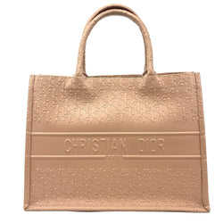 Front view of the Dior Small Book Tote in embossed Oblique calfskin