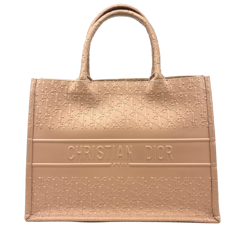 Front view of the Dior Small Book Tote in embossed Oblique calfskin