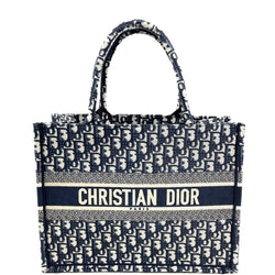 Front view of the Dior Small Book Tote in Oblique canvas