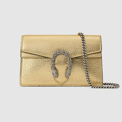 The Gucci Dionysus Super Mini in gold lamé leather is displayed upright