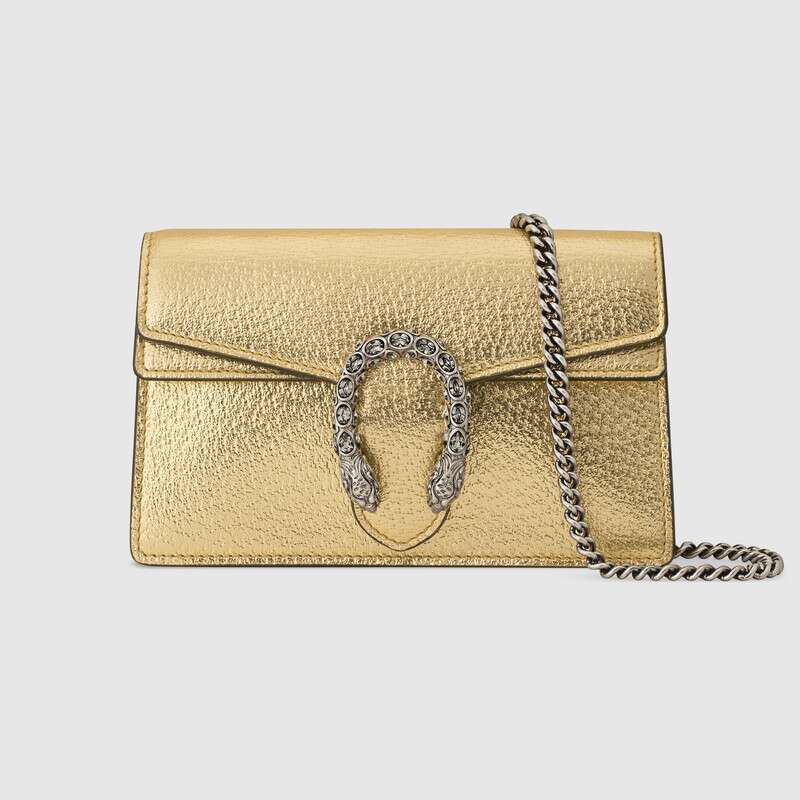 The Gucci Dionysus Super Mini in gold lamé leather is displayed upright