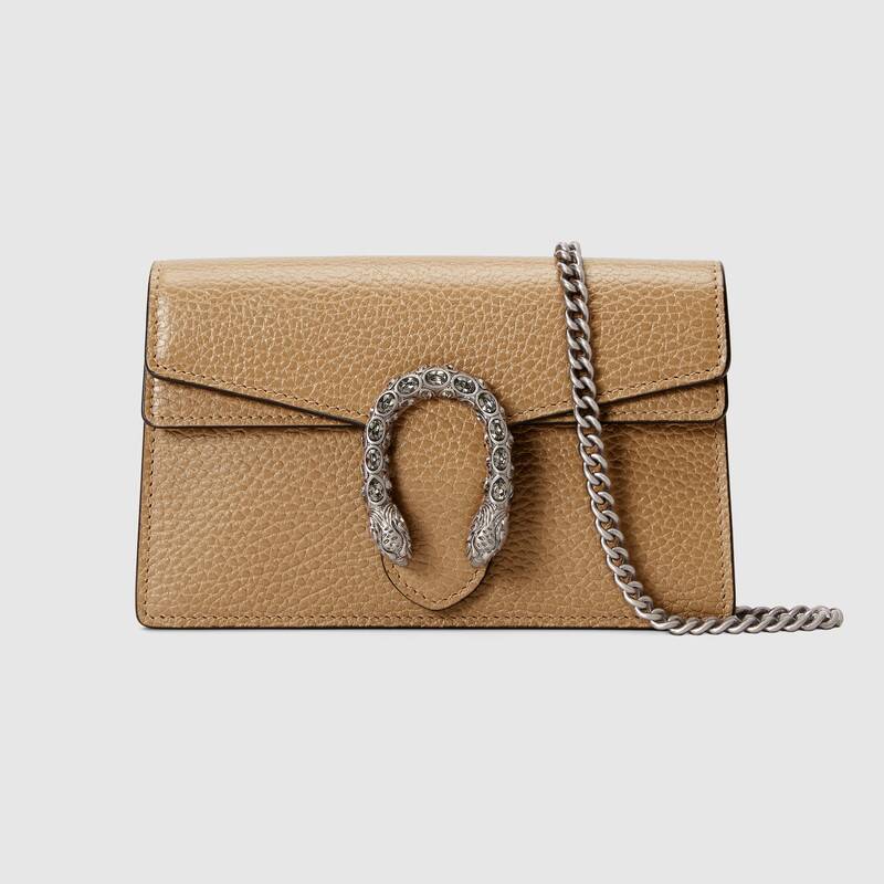 A close-up of the shimmering gold lamé leather texture