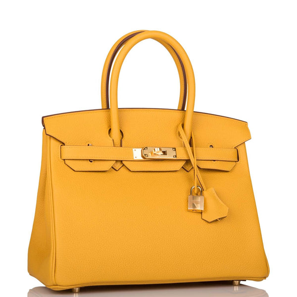 Hermes Birkin 30 handbag in Jaune Ambre Togo leather with gold hardware.