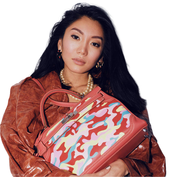 Side profile of vintage Hermes Kelly 32 showing broguing detail