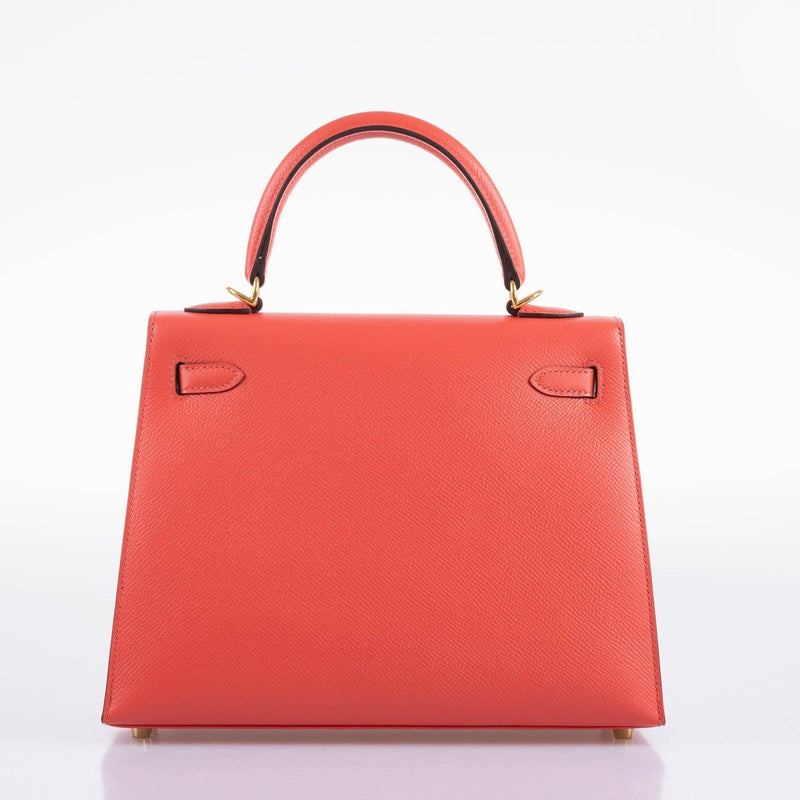 A close-up view of the gold-tone clochette