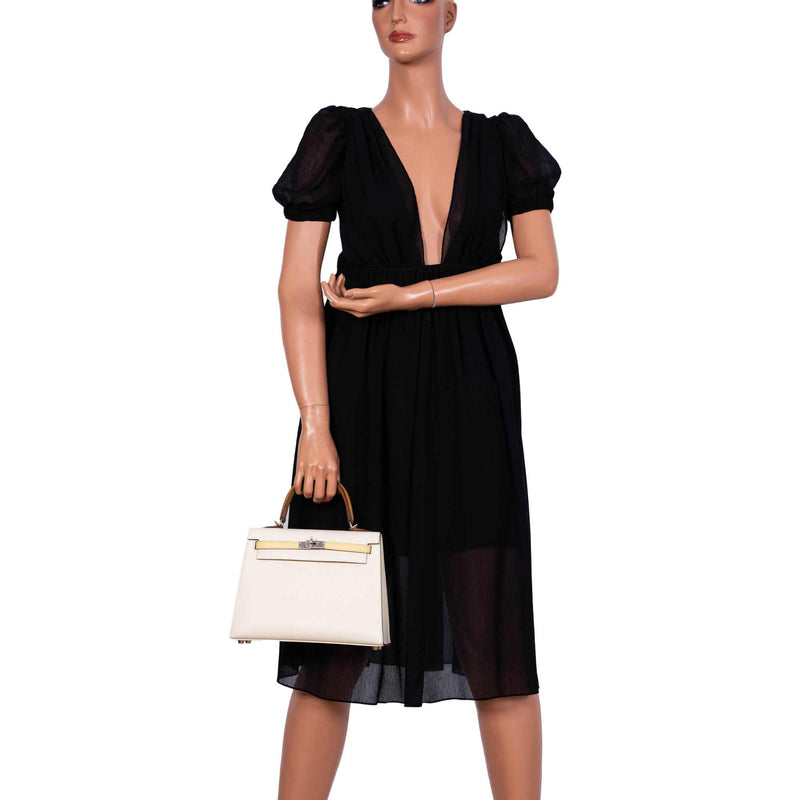 The tri-color bag displayed upright, showcasing the combination of colors