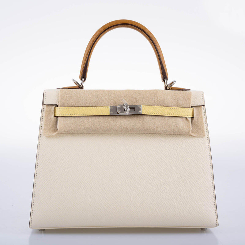 The Hermes Kelly 25 tri-color bag with its removable shoulder strap