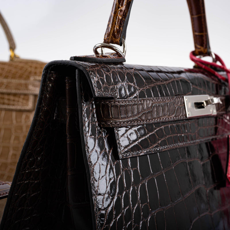 The side profile of the bag, showing the matte Ebene alligator
