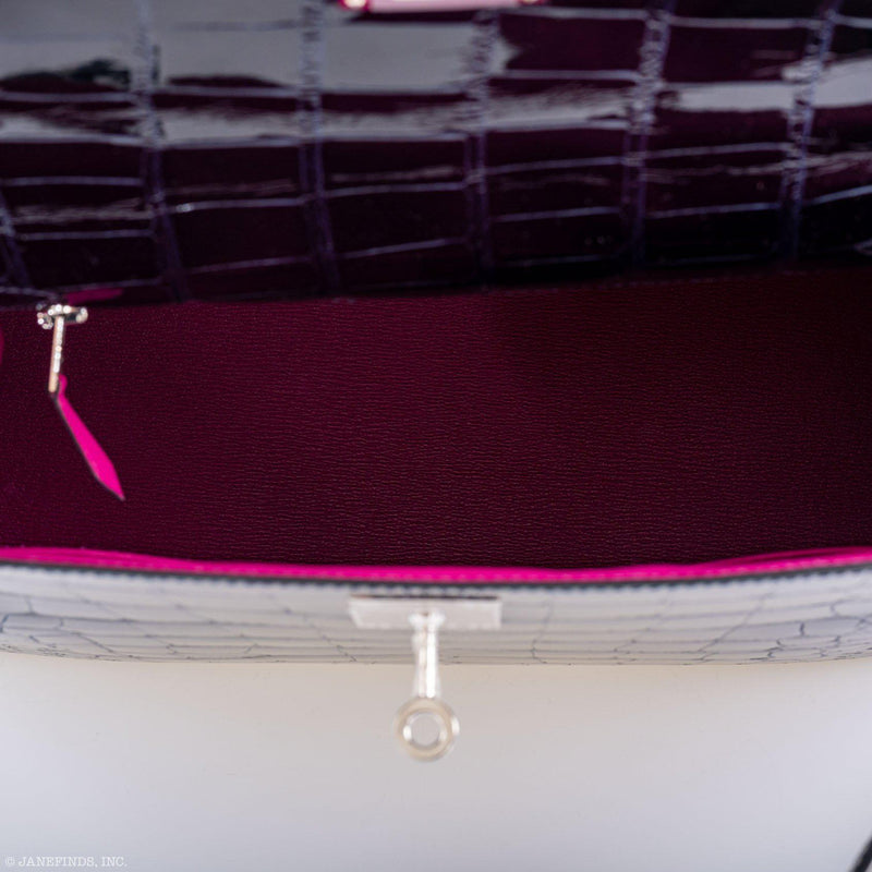 A detailed shot of the palladium-tone hardware and signature turn-lock