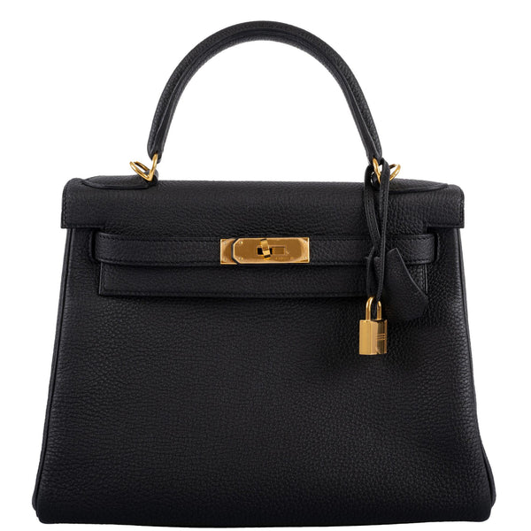 Hermes Kelly 28 Retourne handbag in Black Togo leather with gold hardware.
