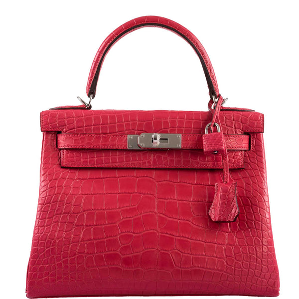 Hermes Kelly 28 Retourne handbag in Rose Extreme matte alligator with palladium hardware.