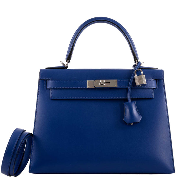 Hermes Kelly 28 Sellier handbag in Blue Electric Tadelakt leather with palladium hardware.