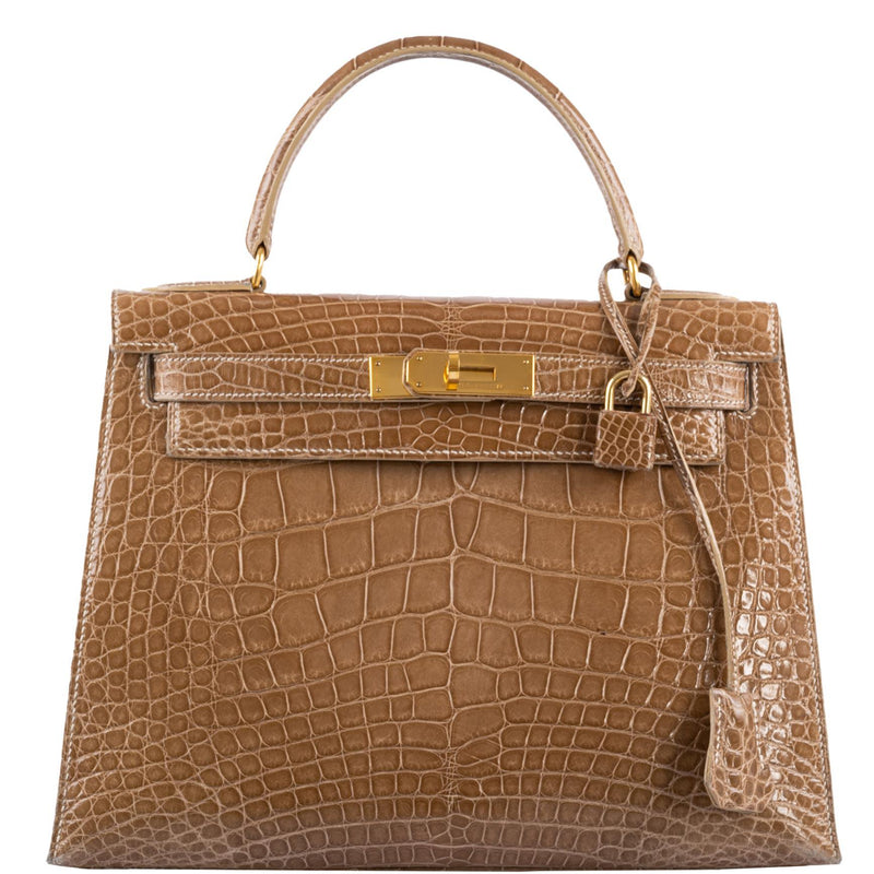 Hermes Kelly 28 Sellier handbag in Ficelle Alligator with gold hardware.