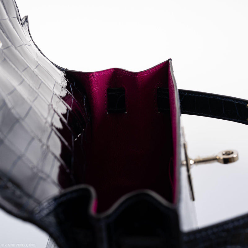 A side profile of the bag, highlighting the structured shape and two-tone interior