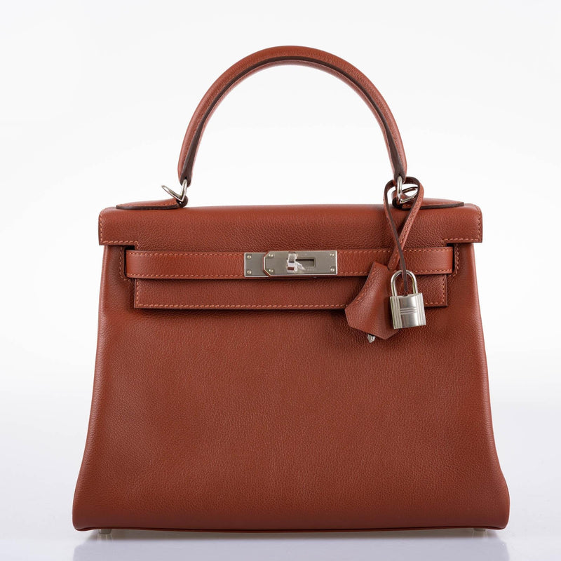 The Hermes Kelly 28 shown with its shoulder strap unbuckled