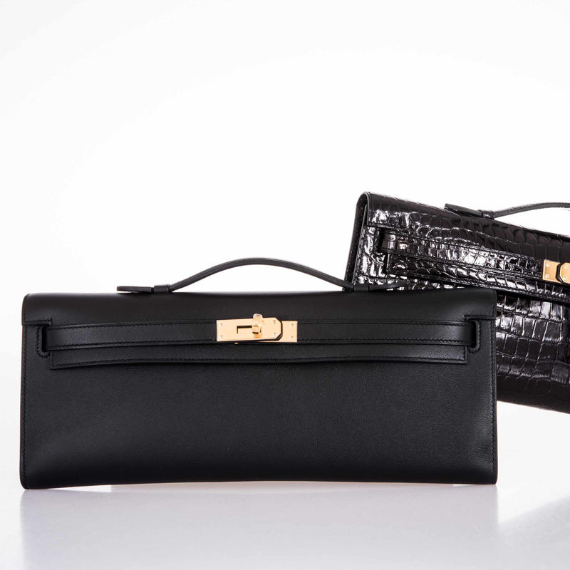 Interior view of Hermes Kelly Cut black Swift leather clutch