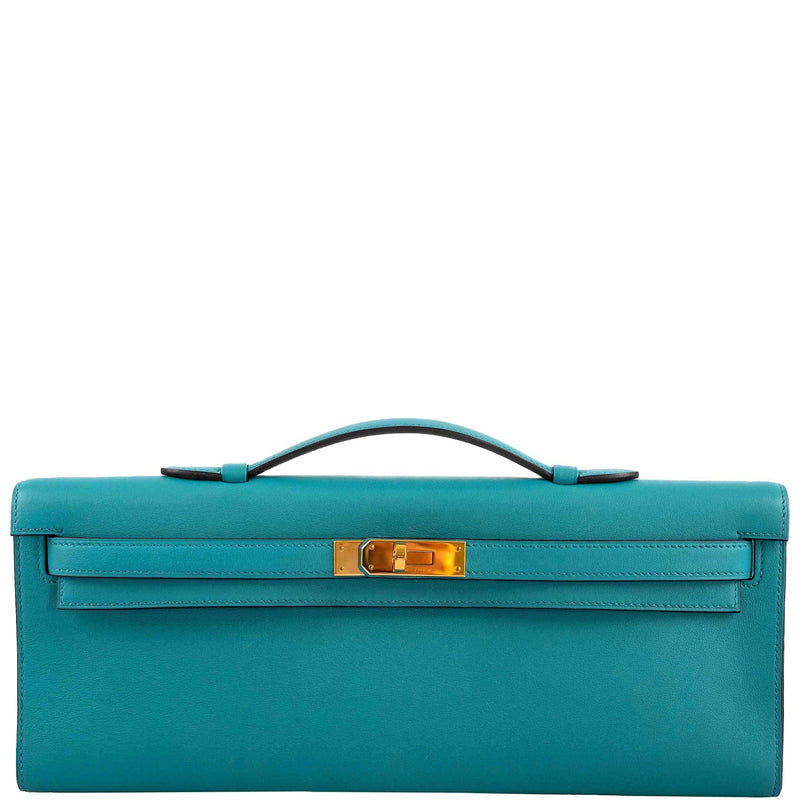 Hermes Kelly Cut clutch bag in Blue Paon Swift leather with gold hardware.