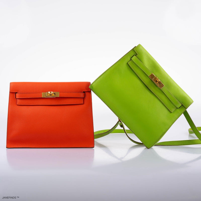 Luxury display of Hermes Kelly Danse II apple green Swift leather bag.