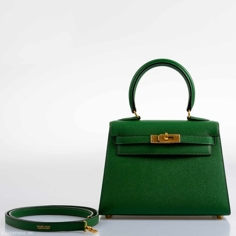The back view of the Hermes Kelly Mini Pochette, showing the single flat strap