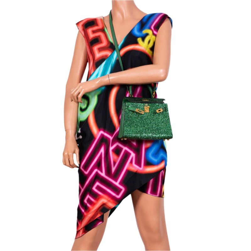 Hermes Kelly of Oz 20 Vert Clair shown styled on a model for size reference

