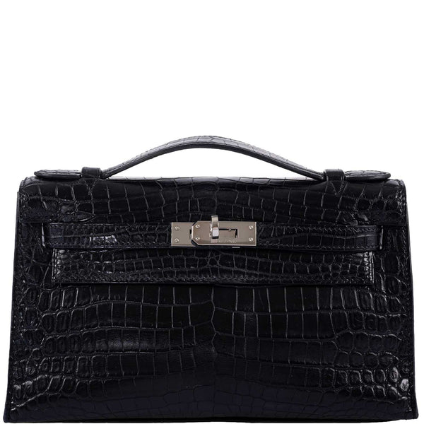 Hermes Kelly Pochette clutch in Black Matte Niloticus Crocodile leather with Palladium hardware.