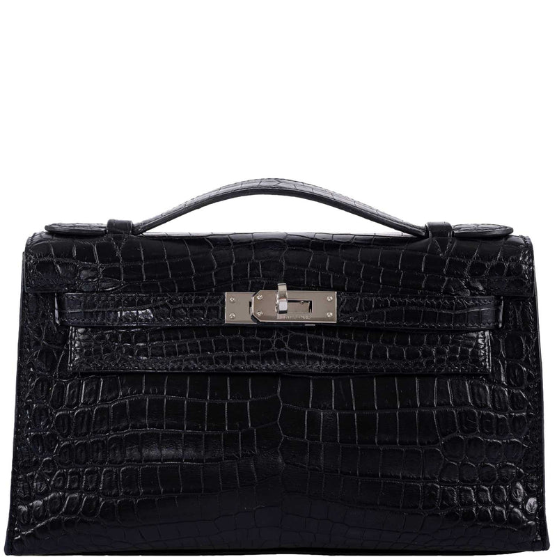 Hermes Kelly Pochette clutch in Black Matte Niloticus Crocodile leather with Palladium hardware.