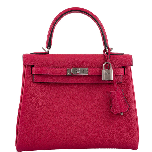 Front view of the Hermes Kelly Retourne 25 in Framboise Togo leather