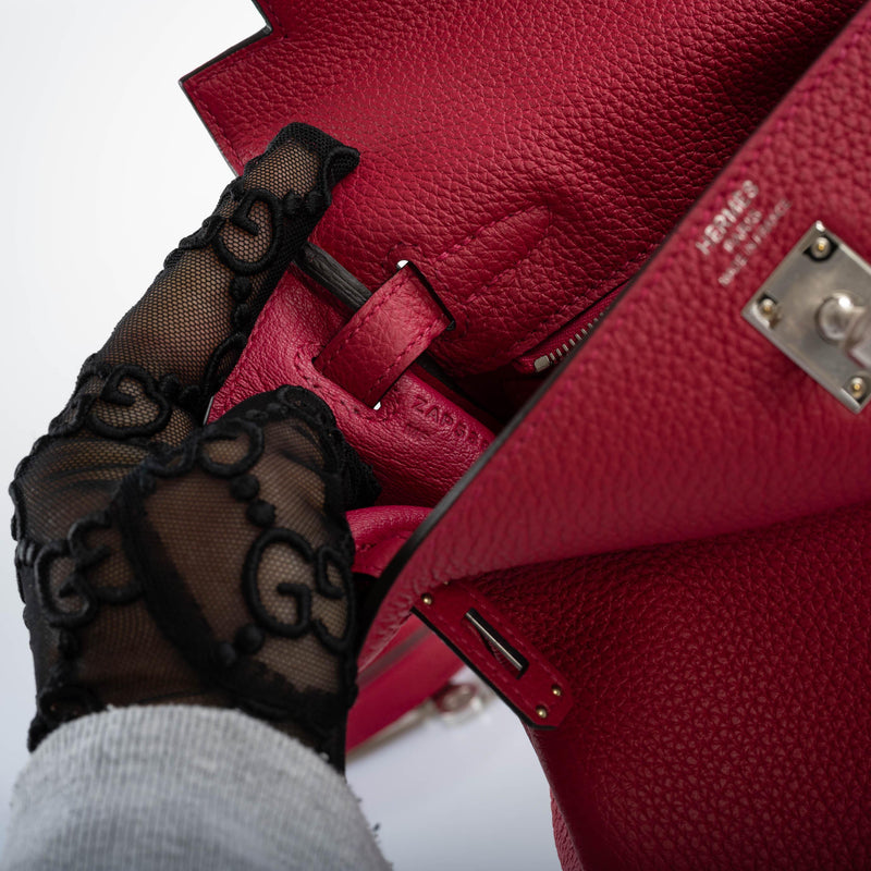 Detail of the removable strap clasps and their palladium hardware