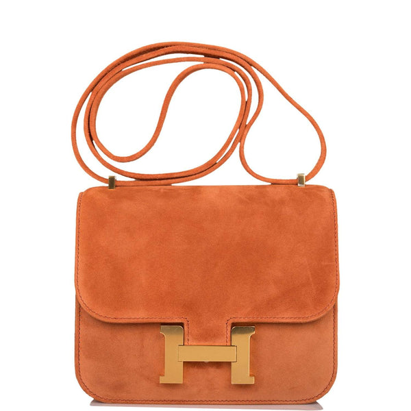 Hermes Mini Constance 18 handbag in Paprika Doblis suede with gold hardware.