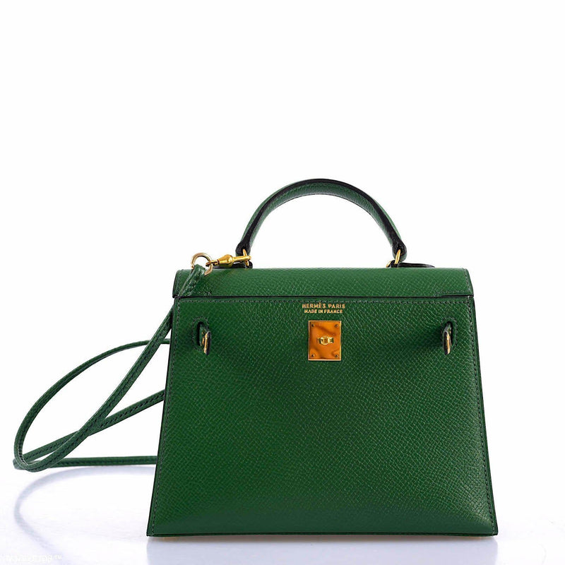 A detailed shot of the gold-tone clochette and lock