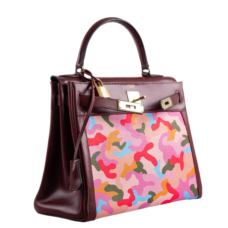 Lifestyle image of Hermes Camouflage Kelly 28 painted collector's bag