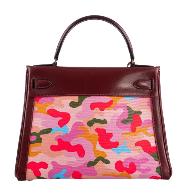 Angled shot of Hermes Retourne Kelly 28 with camouflage painting
