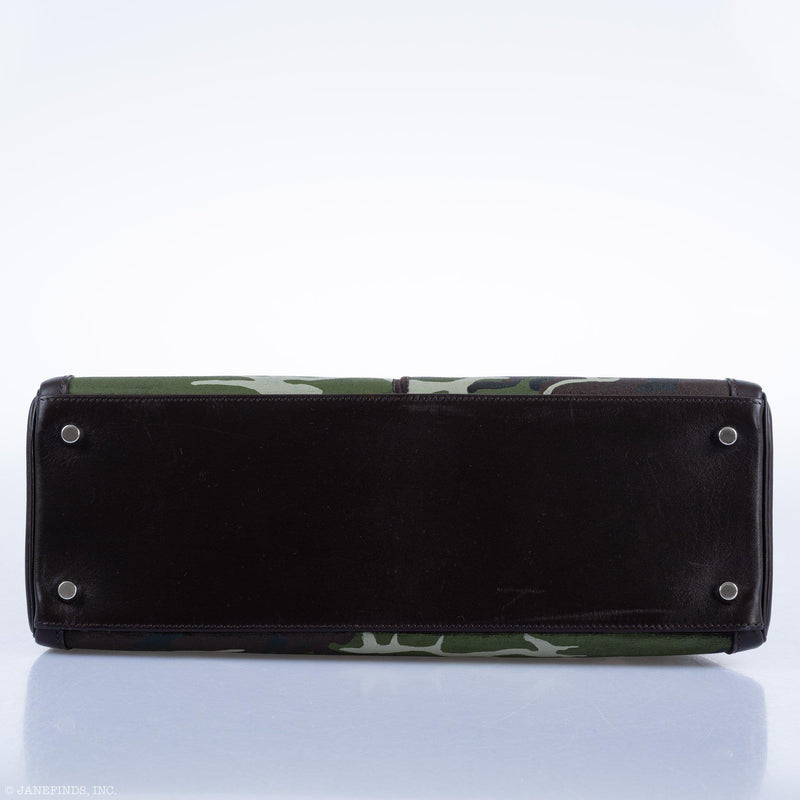 Side profile of painted Hermes Kelly Lakis with brown leather and canvas