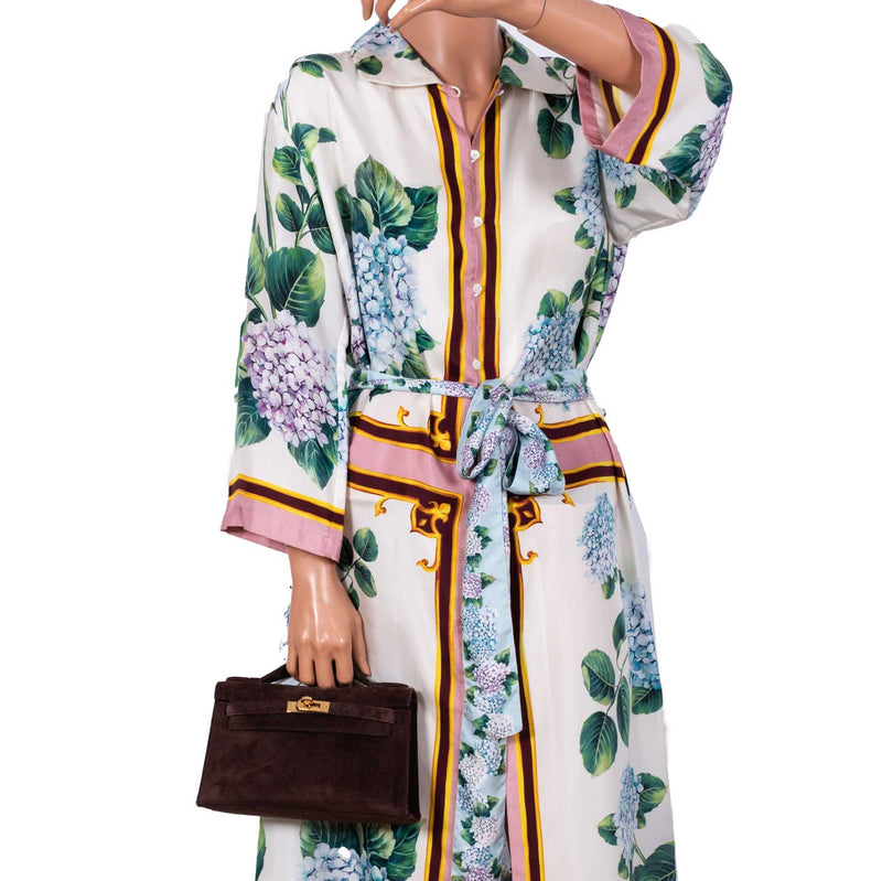 Angled view showing rich suede texture and gold hardware accents