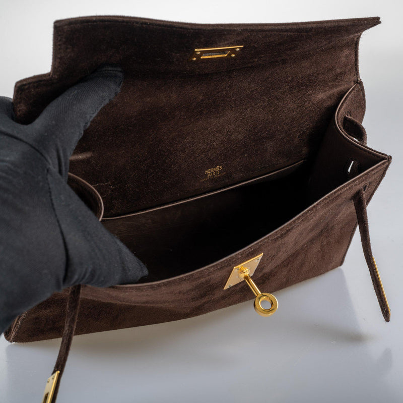 Close-up of gold turn-lock hardware