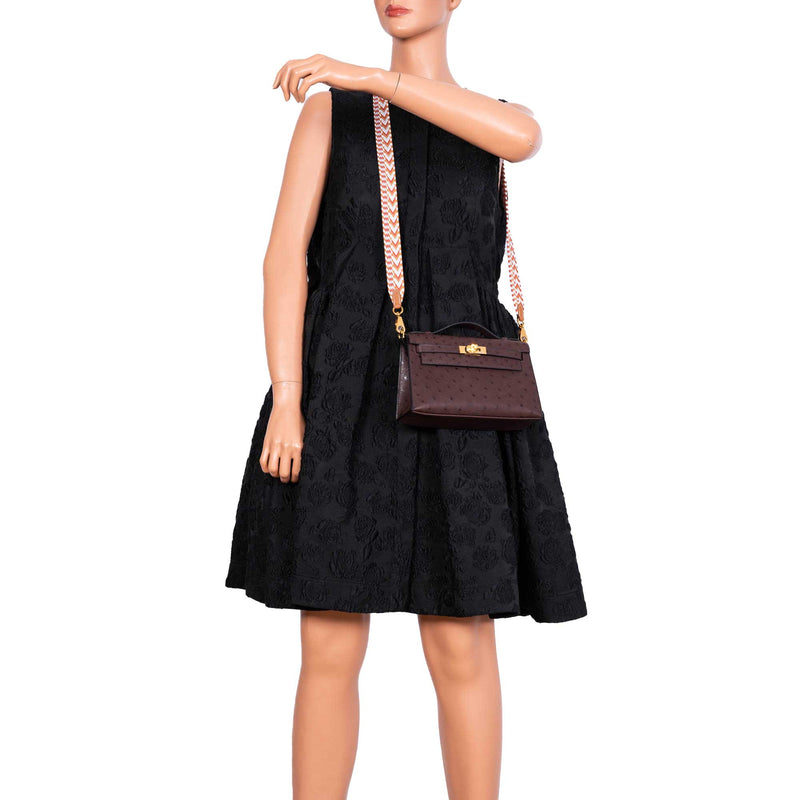 Angled view highlighting quill pattern and structured silhouette