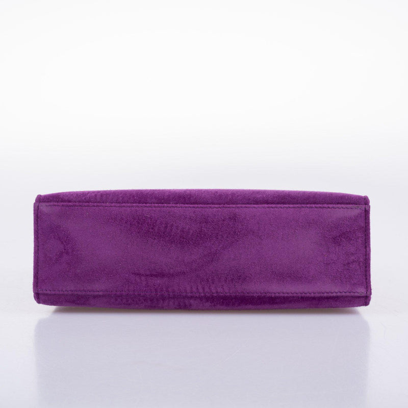  Palladium turn-lock close-up on Violet pochette
