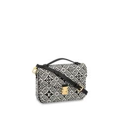 Front view of the Louis Vuitton Pochette Metis in Jacquard Since 1854 textile