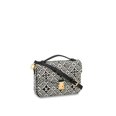 Front view of the Louis Vuitton Pochette Metis in Jacquard Since 1854 textile